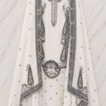 Zariya Off-White Weaved Muslin Suit